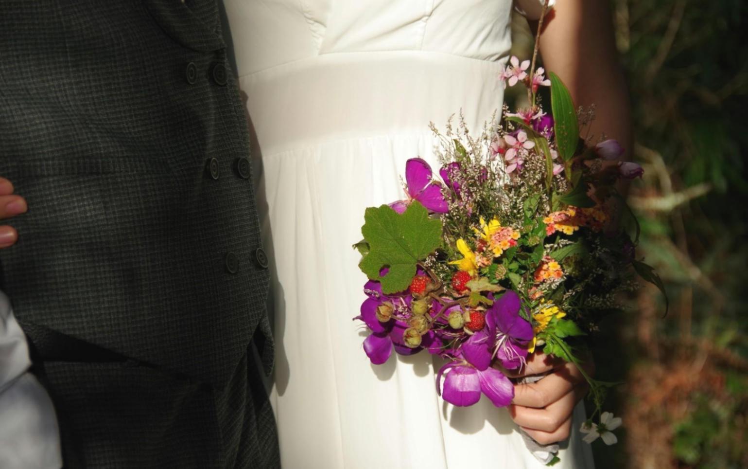 Detailed view of artisan flower arrangement process